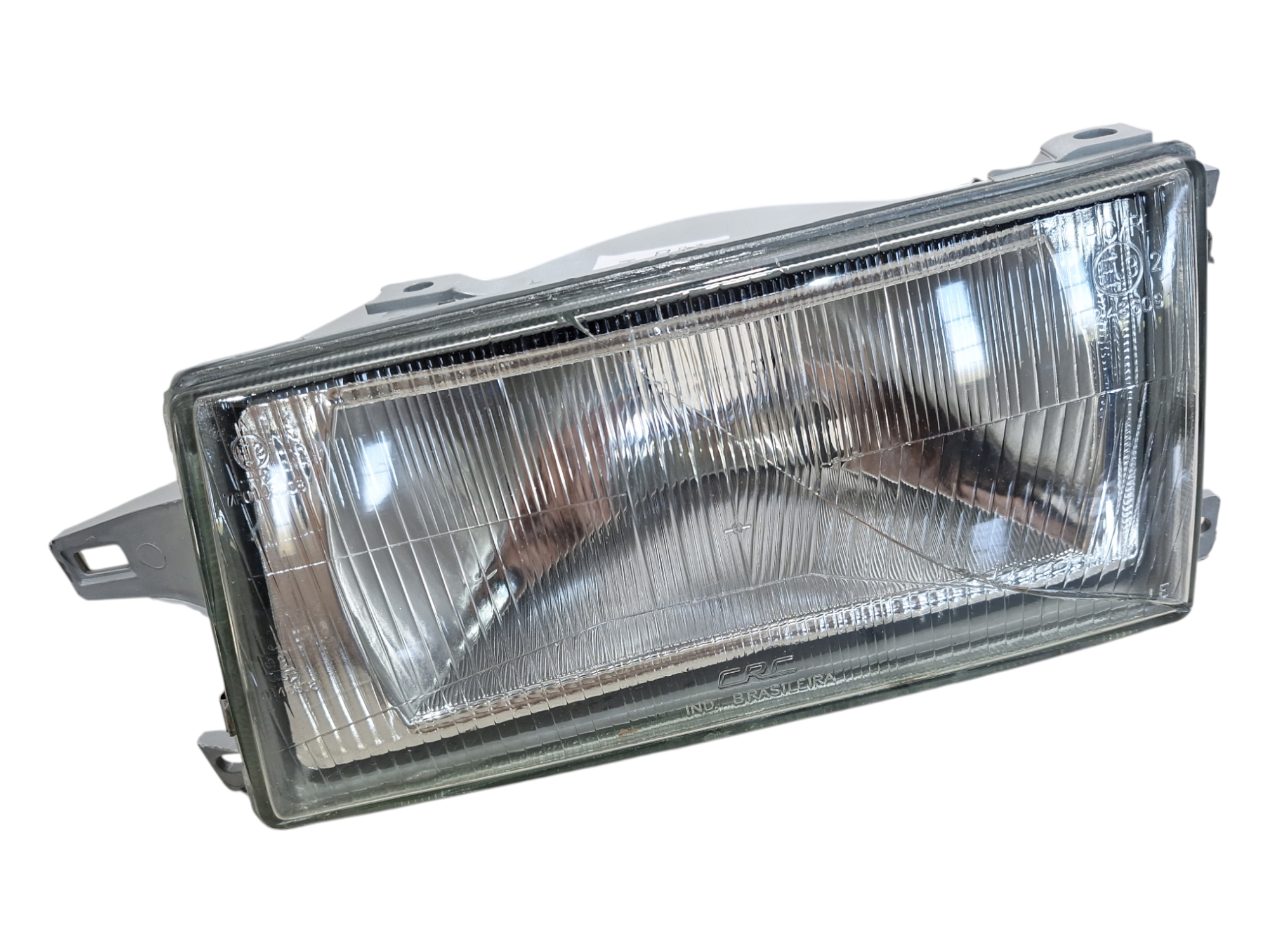 farol dianteiro esquerdo fiat uno fiorino 1991 2003 detalhe